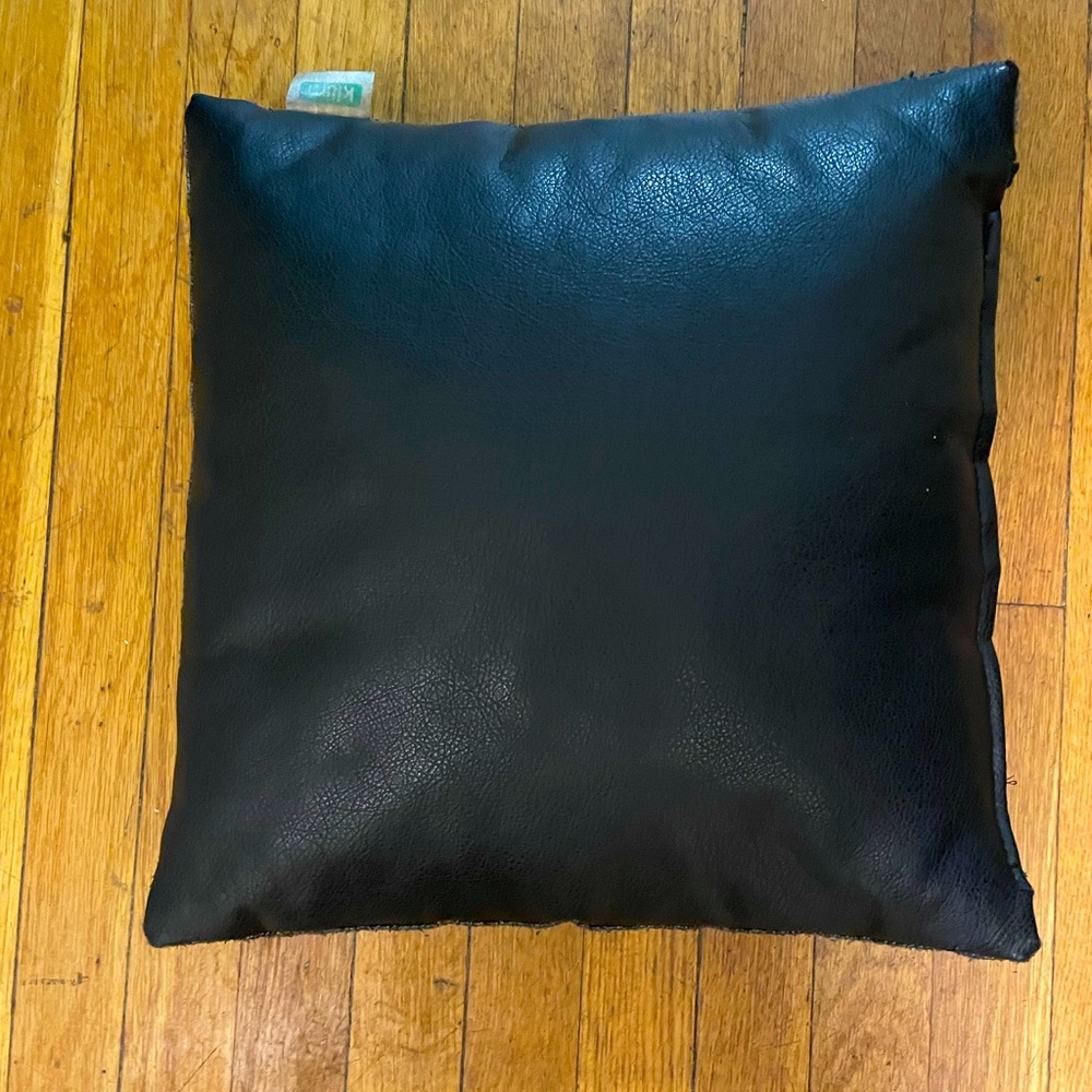Kilim pillows - half vegan leather, the other side gray Turkish wool.